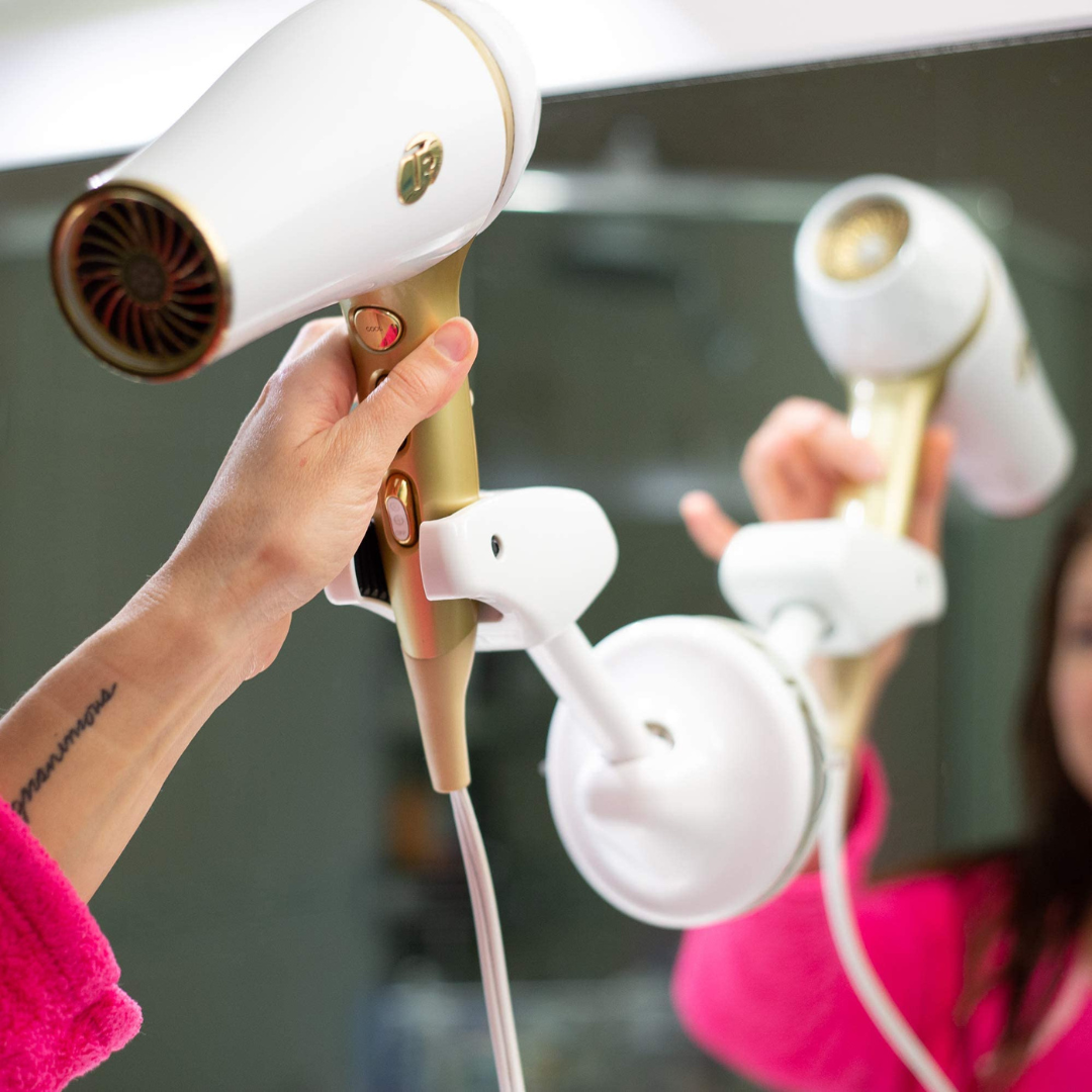 Adjustable hair dryer holder